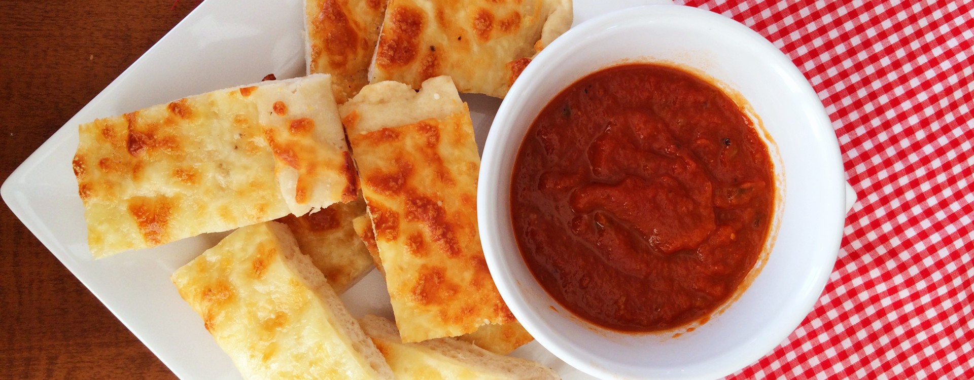 Homemade Cheesy Breadsticks The Gingham Apron