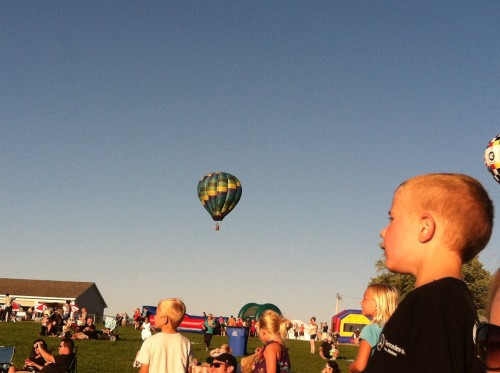 Matthew taking mental notes of each balloon floating by!