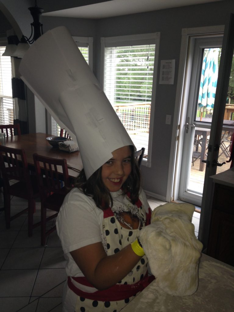 Addison wearing her chef's hat