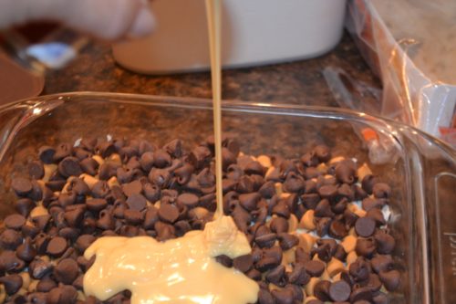 Pouring in the sweetened condensed milk