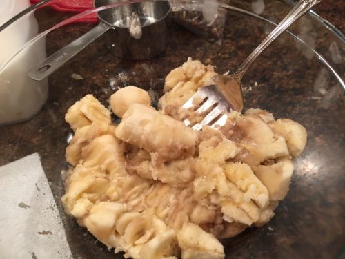 I use a table meat fork to mash the bananas. Works great!