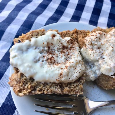 Keto Cinnamon Roll Muffin In A Mug with Cream Cheese Frosting